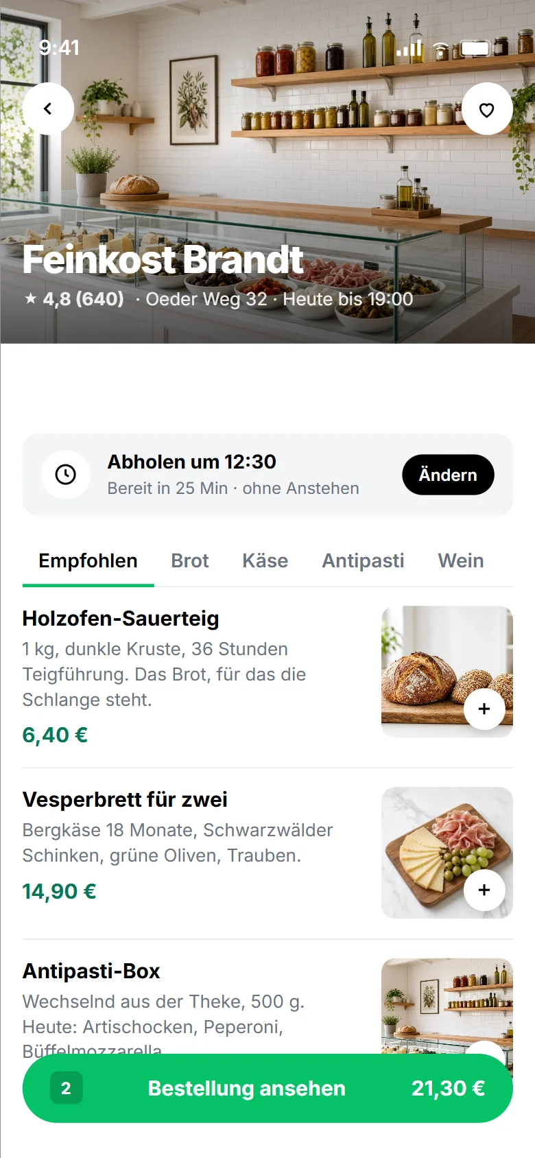Ladenseite der Feinkost-PWA mit Foto der Theke, Abholzeit 12:30, Reitern Empfohlen, Brot, Käse, Antipasti, Wein, Produktliste mit Foto rechts und grünem Button Bestellung ansehen 21,30 Euro